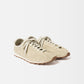 Beige sneaker on a white background