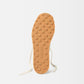 Beige sneaker on a white background