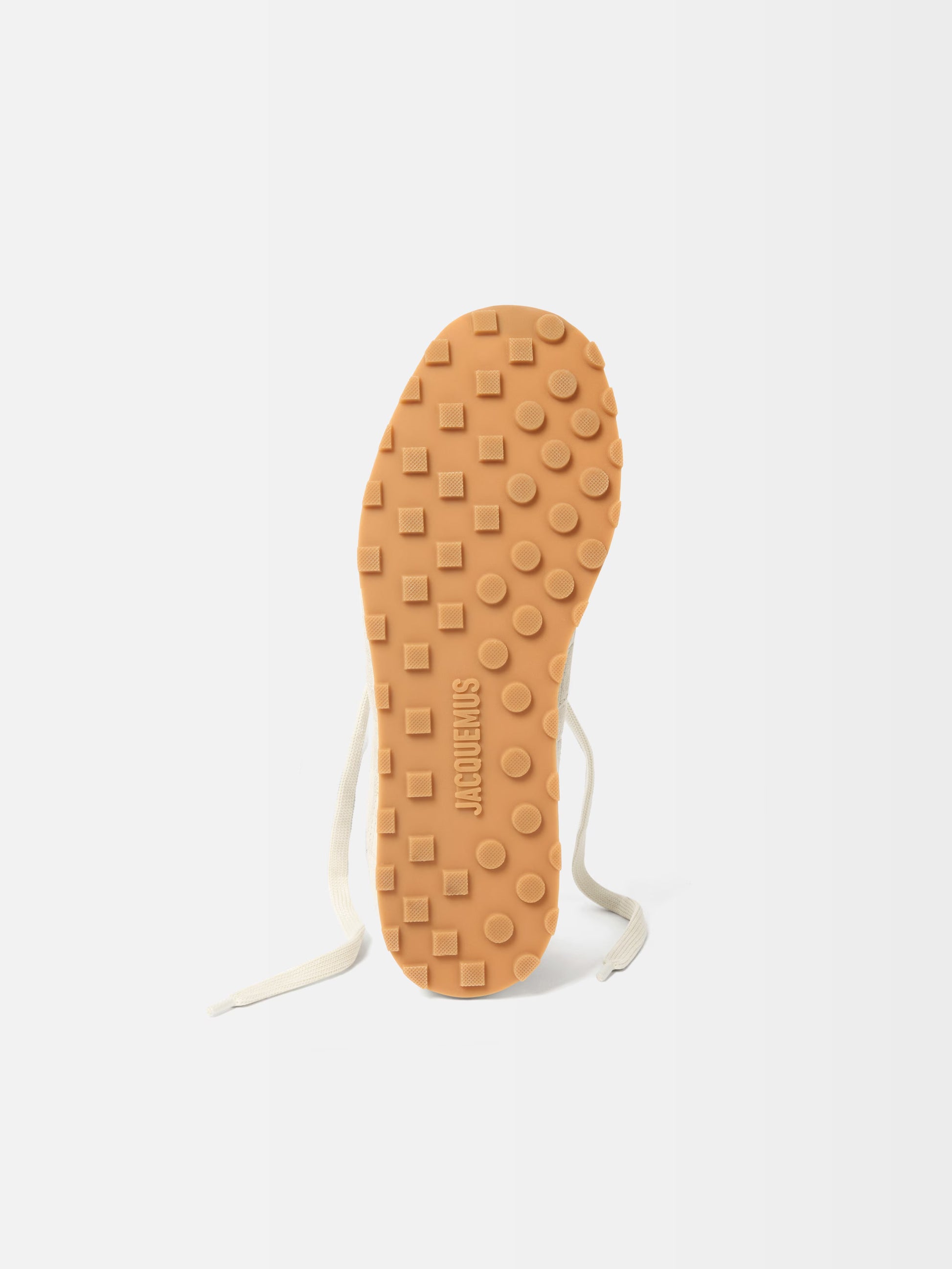 Beige sneaker on a white background