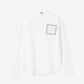 White shirt with a small black logo on the chest against a white background