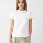 White t-shirt with a small logo on a white background JACQUEMUS