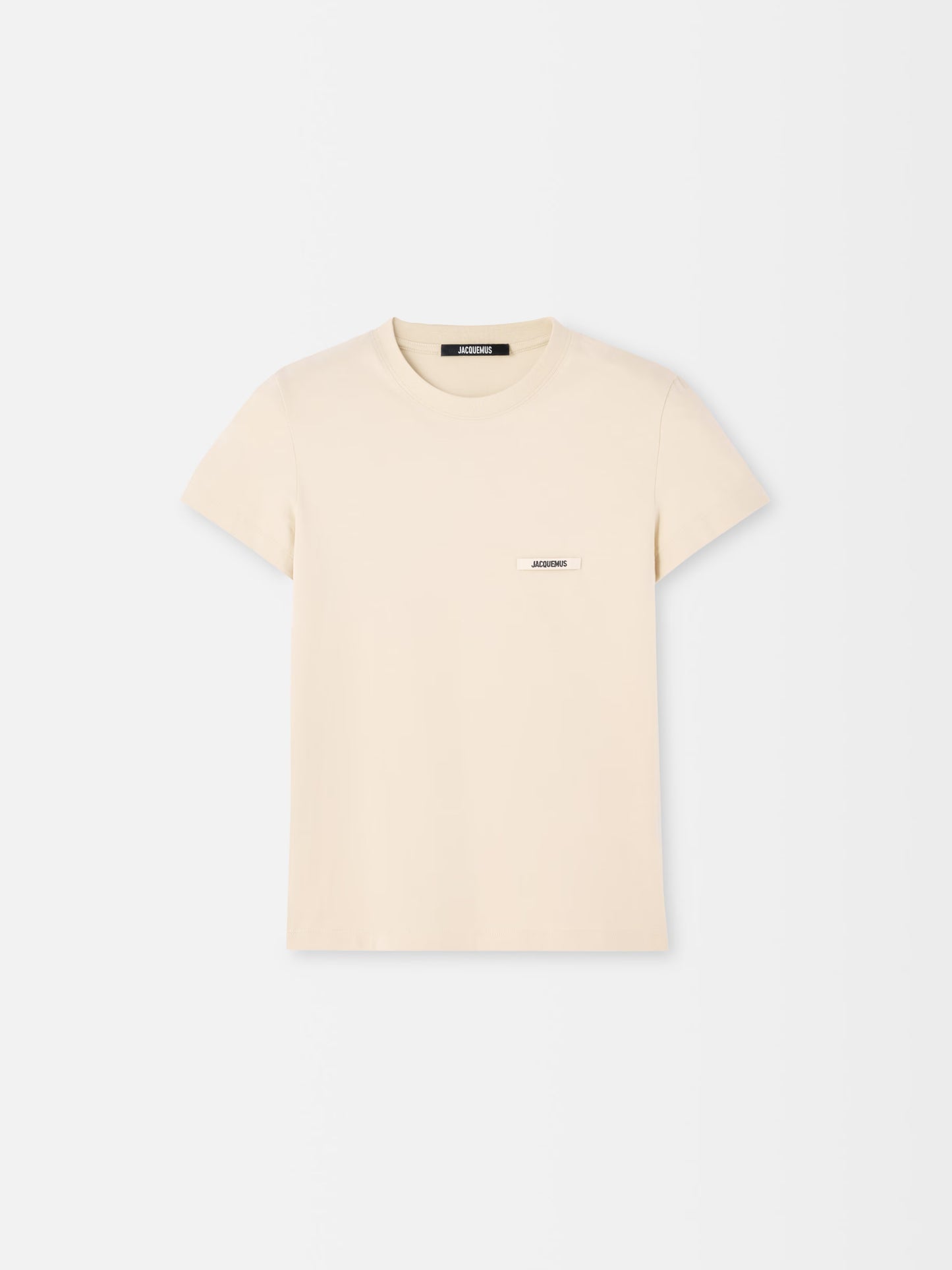 beige t-shirt with a small logo on a white background JACQUEMUS