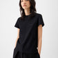 black t-shirt with a small logo on a white background JACQUEMUS