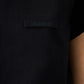 black t-shirt with a small logo on a white background JACQUEMUS