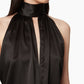 Backless dress with bow detail