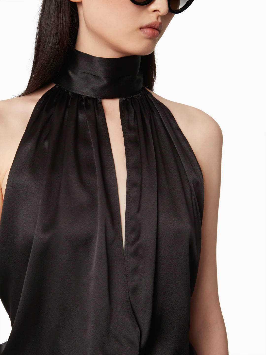 Backless dress with bow detail