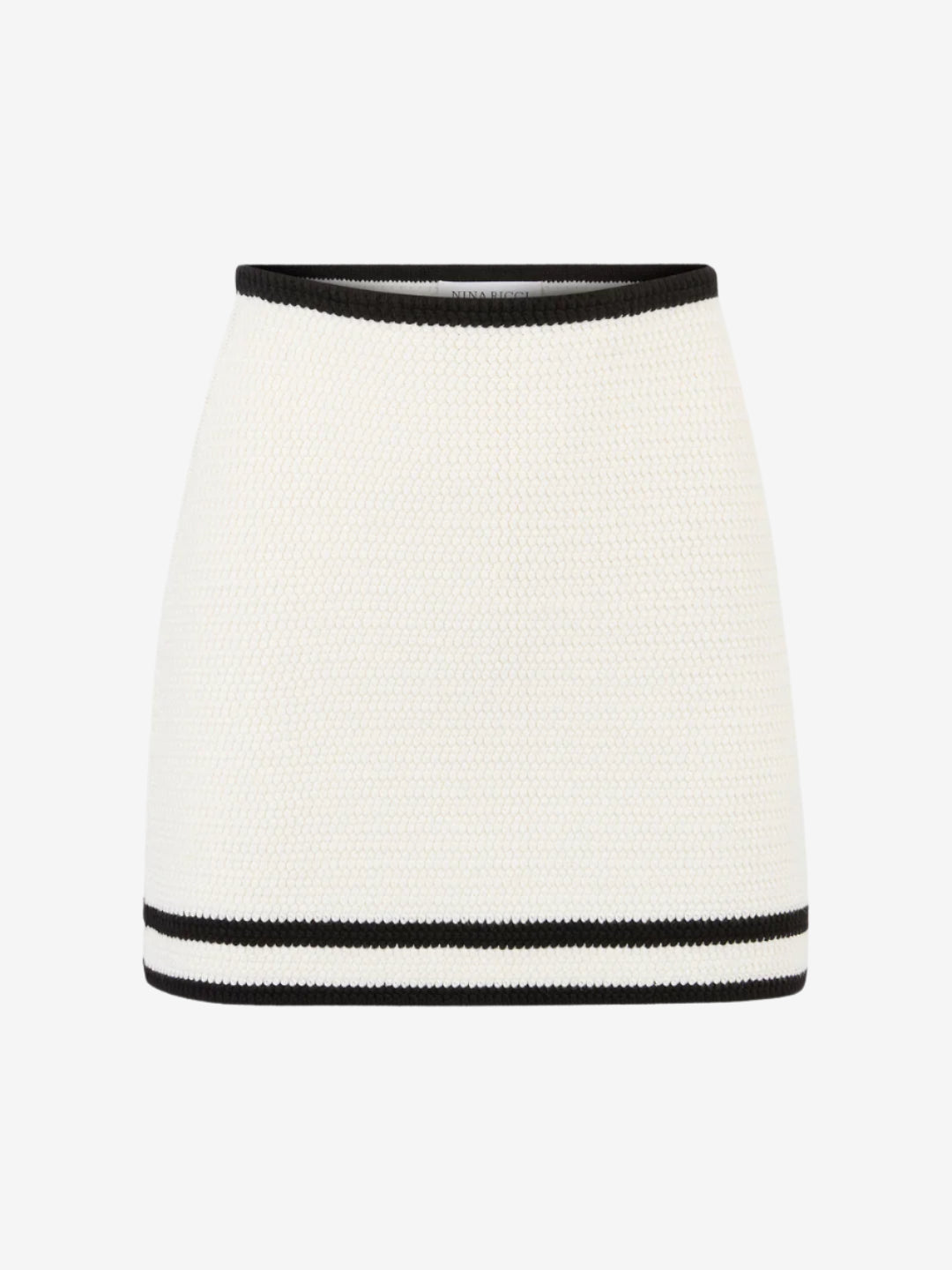 White skirt with black trim on a white background