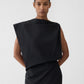 Black one-shoulder dress on a white background JACQUEMUS