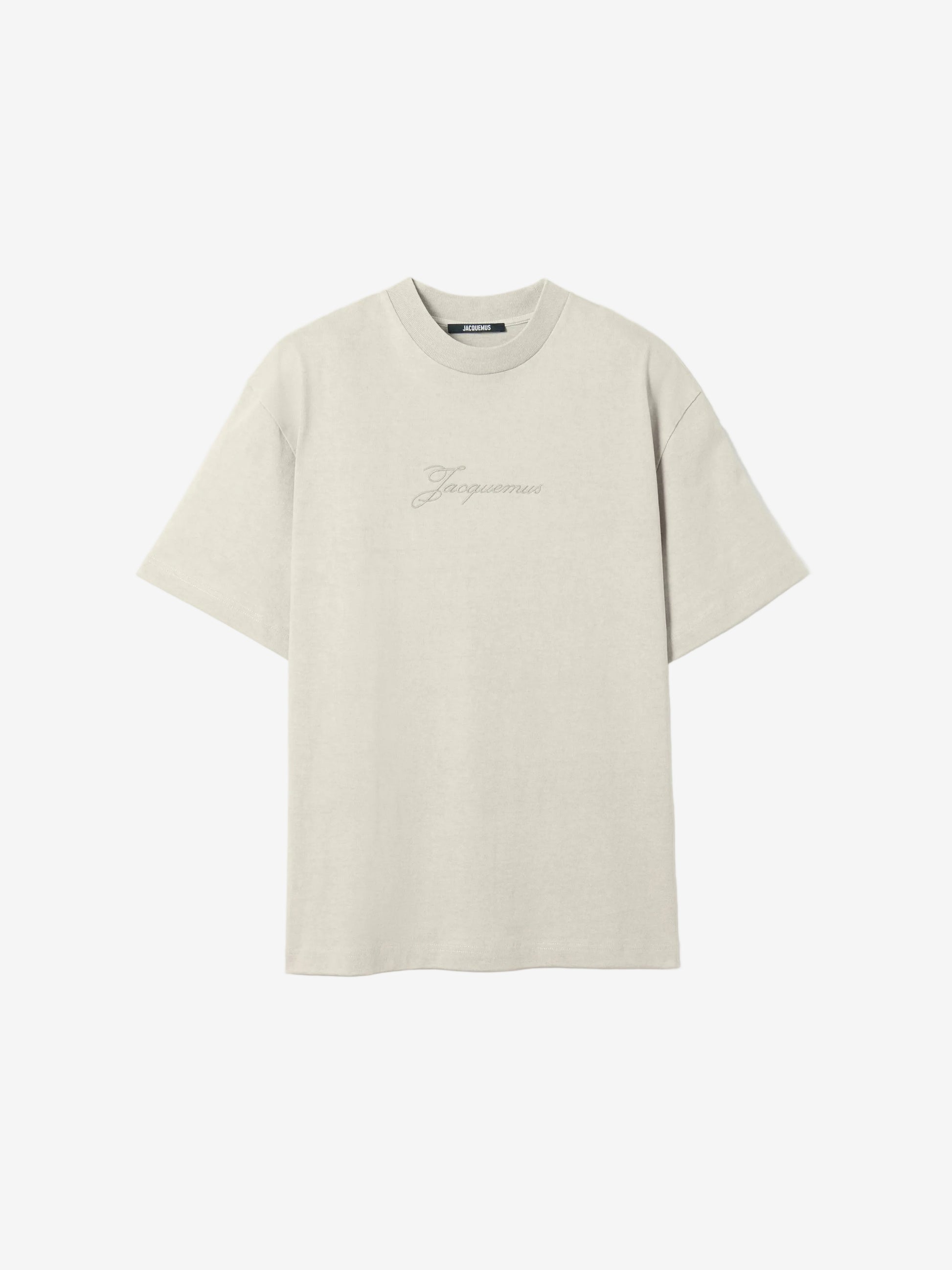Beige t-shirt with a small logo on a white background