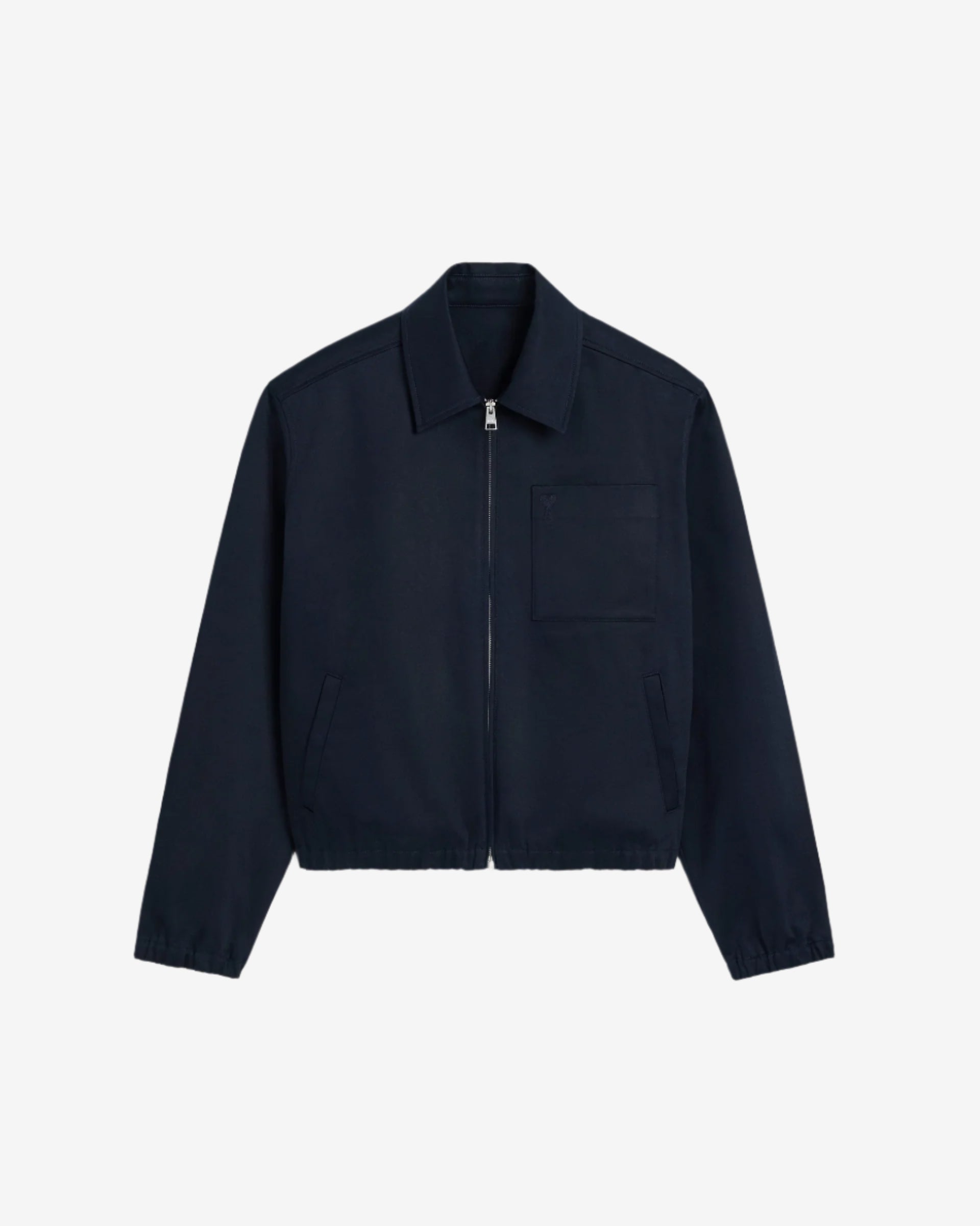 Navy blue jacket on a beige background