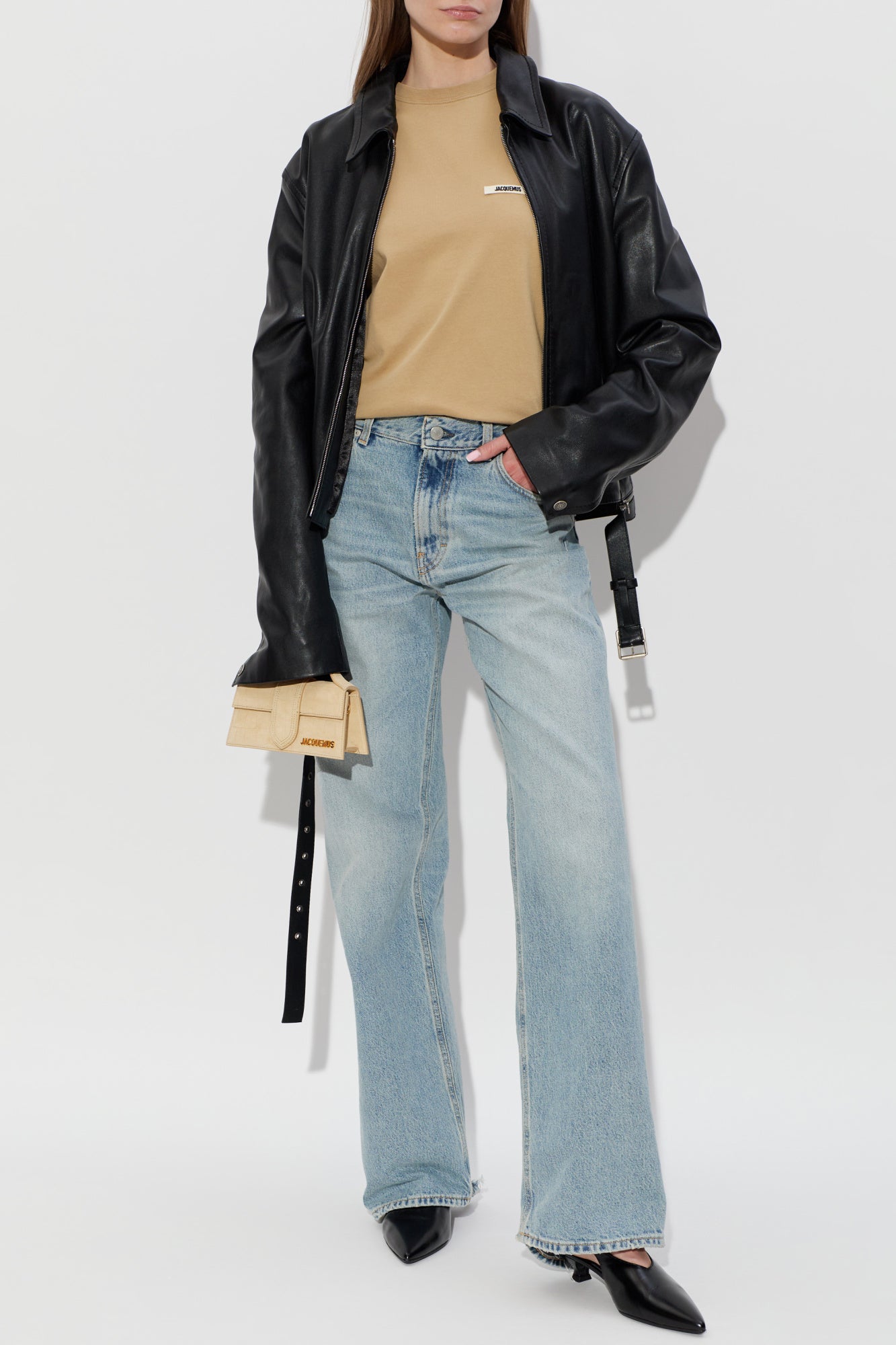 dark beige t-shirt with a small logo on a white background JACQUEMUS