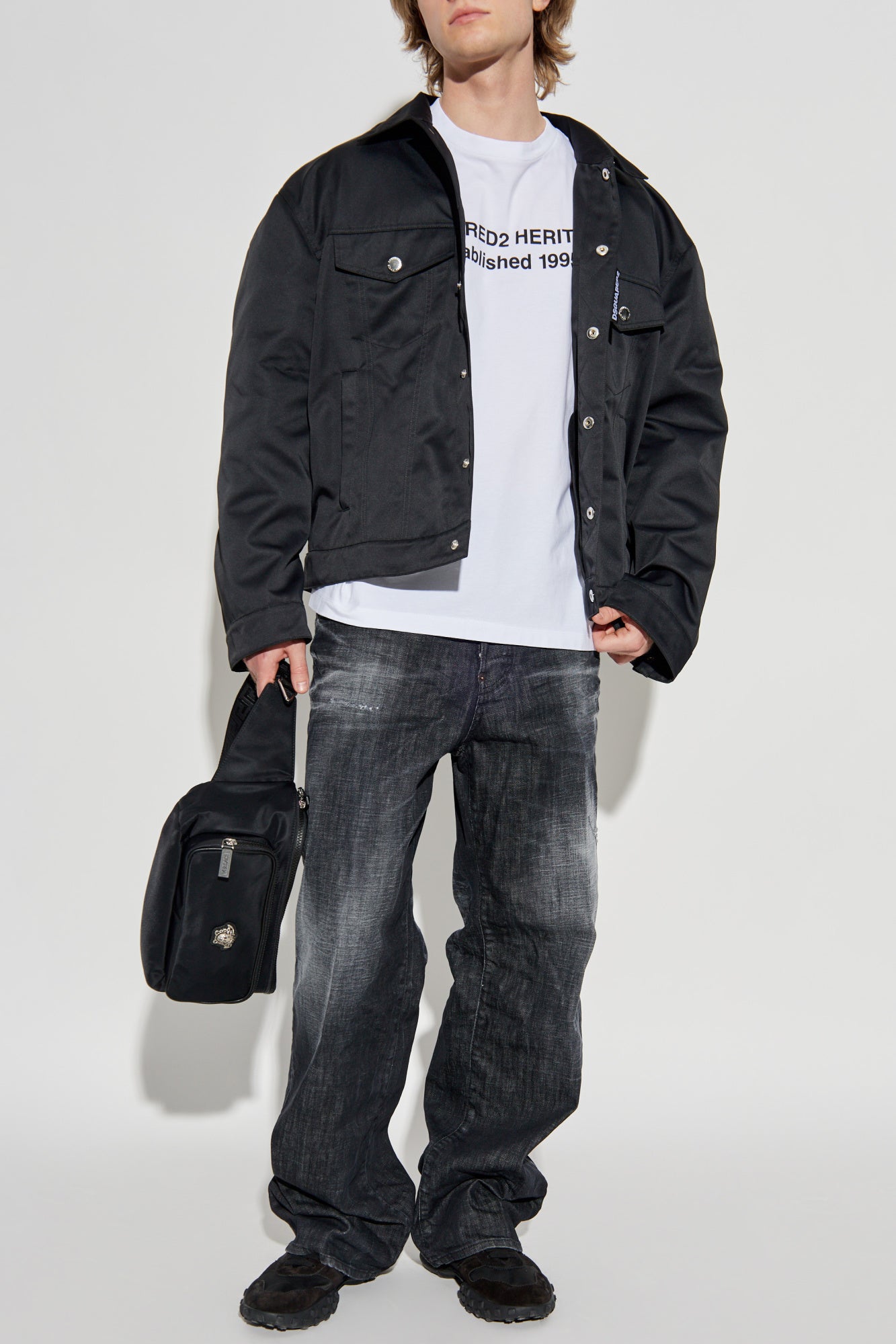 White t-shirt with black text on a white background
