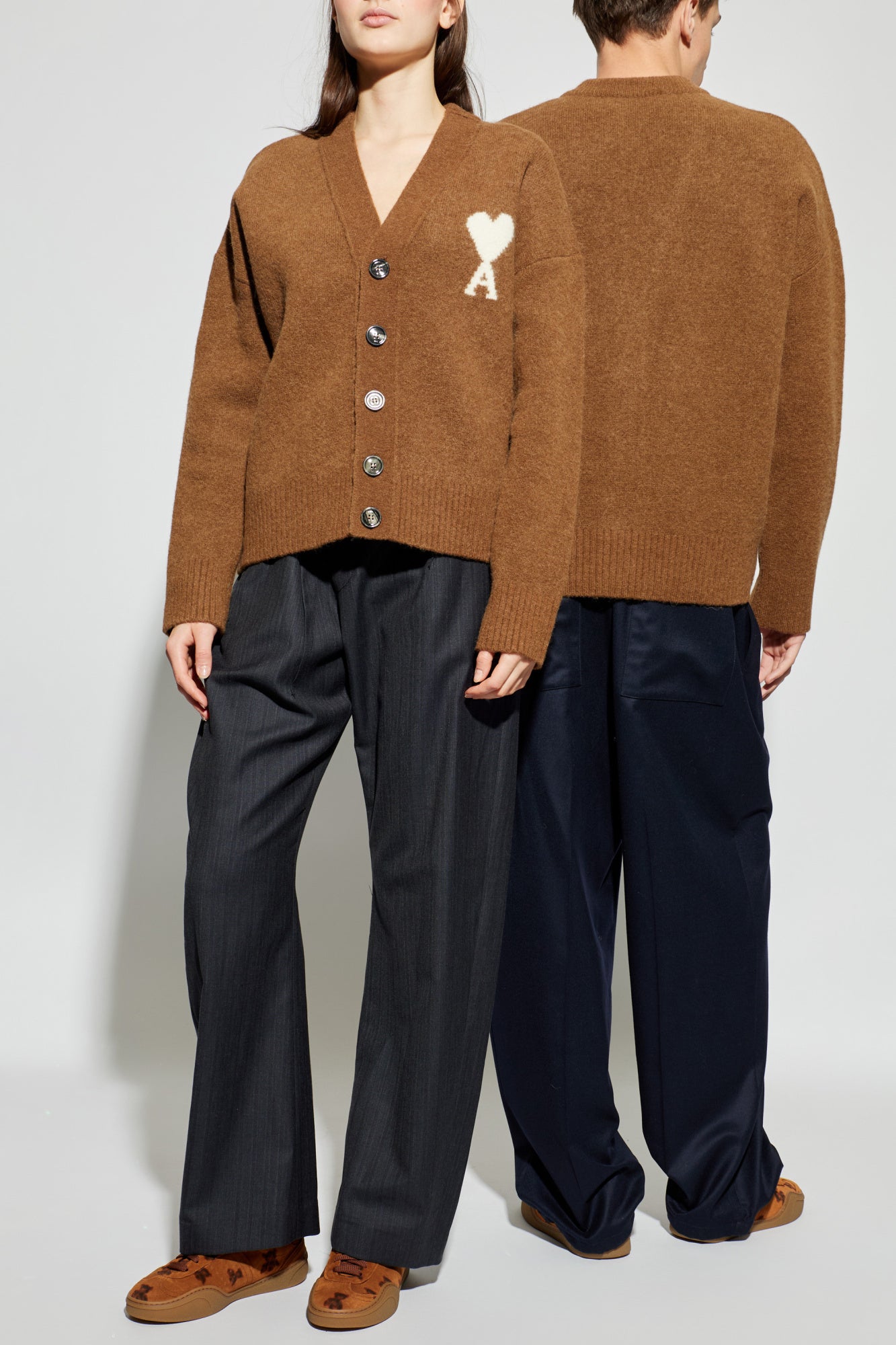 Brown cardigan with a heart and letter 'A' design on a white background ami paris