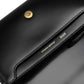 Black wallet with a gold emblem on a white background