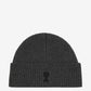 Dark gray knit beanie with a black heart logo on a white background