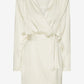 White dress with a belt on a white background