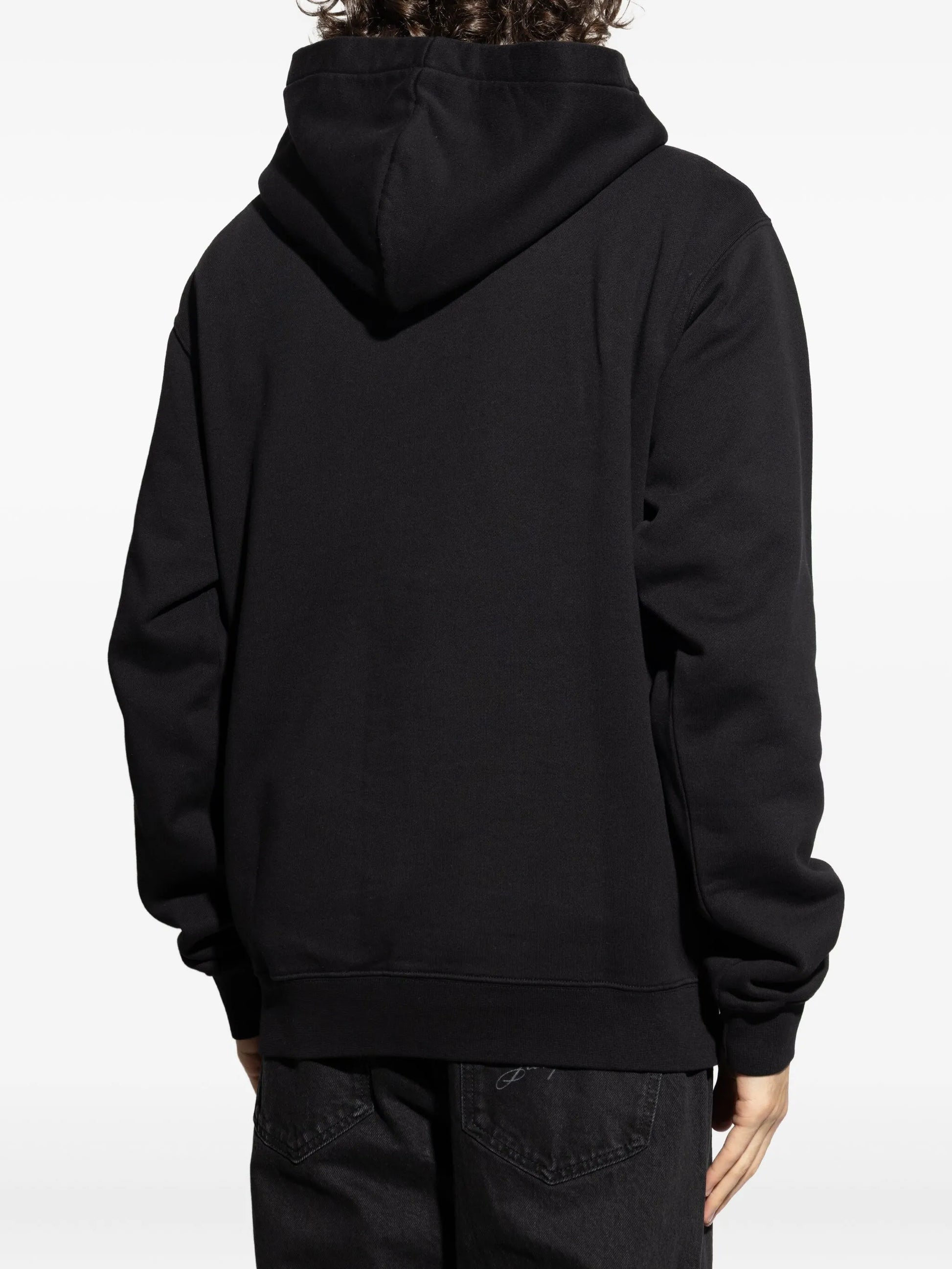 Black hoodie with a small logo on the chest against a white background