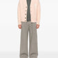  Pink cardigan with button details and a bow design on a white background ami paris