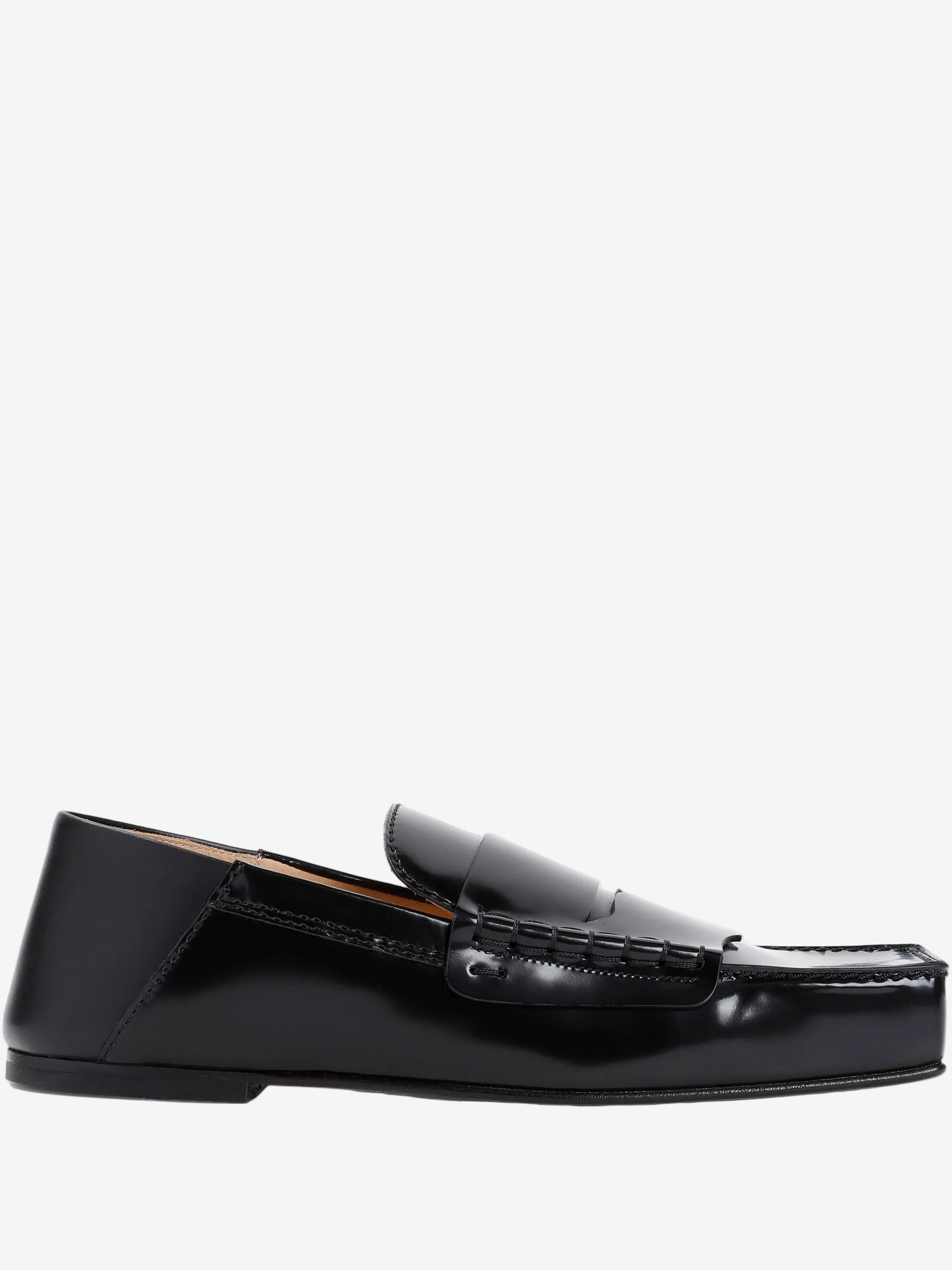 Black loafer shoe on a white background