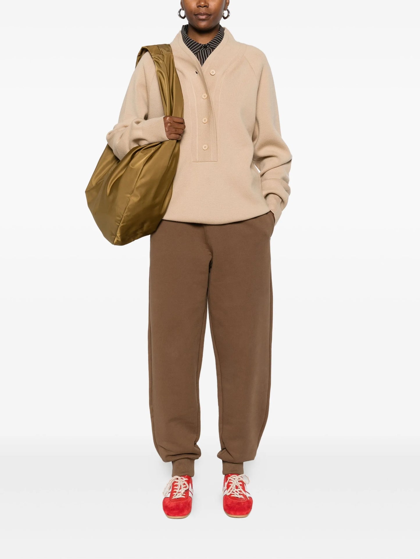 Brown sweatpants with a drawstring on a white background