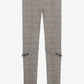 Gray checkered pants with zippers on a white background