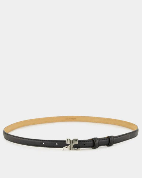 Black belt with a silver buckle on a white background