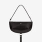 Black textured handbag with a strap on a white background