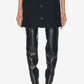 Person wearing a black button-up skirt and black leggings on a white background