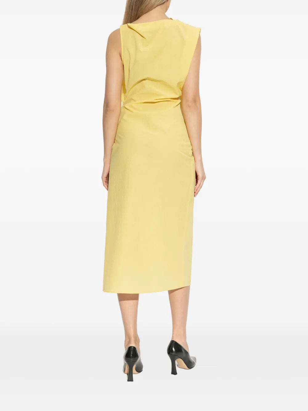 Yellow one-shoulder dress on a white background JACQUEMUS