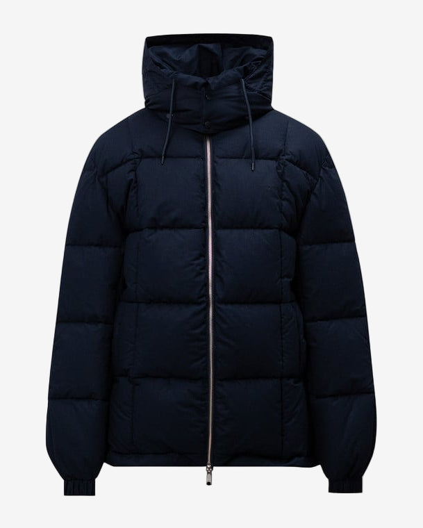 Black puffer jacket on a light gray background