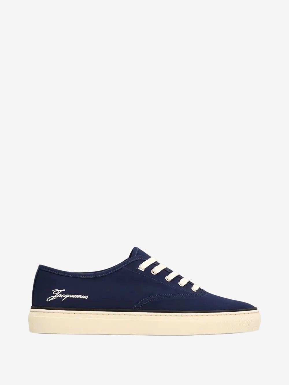 Navy blue sneaker with white laces on a white background