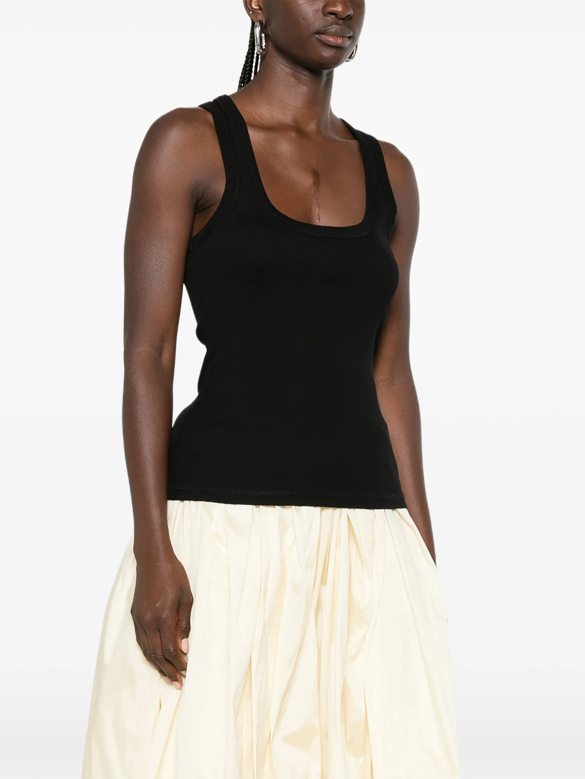 black Crafted from soft ribbed cotton jersey, this fitted tank top is defined by a second skin silhouette and a minimalist design, finished with the signature grosgrain logo detail at the back.

100% ribbed cotton jersey construction

Fitted, second skin silhouette

Square neckline

Ribbed neckline and armholes

Embroidered grosgrain logo at the back