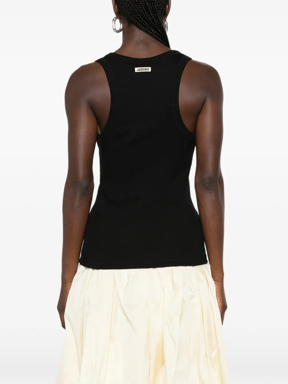black Crafted from soft ribbed cotton jersey, this fitted tank top is defined by a second skin silhouette and a minimalist design, finished with the signature grosgrain logo detail at the back.

100% ribbed cotton jersey construction

Fitted, second skin silhouette

Square neckline

Ribbed neckline and armholes

Embroidered grosgrain logo at the back