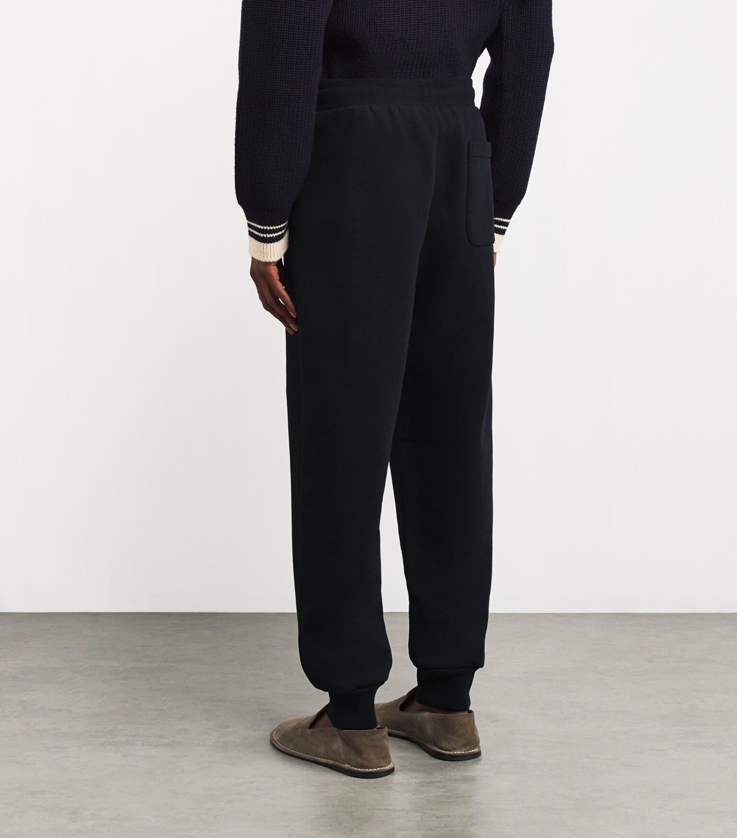 Black sweatpants on a white background