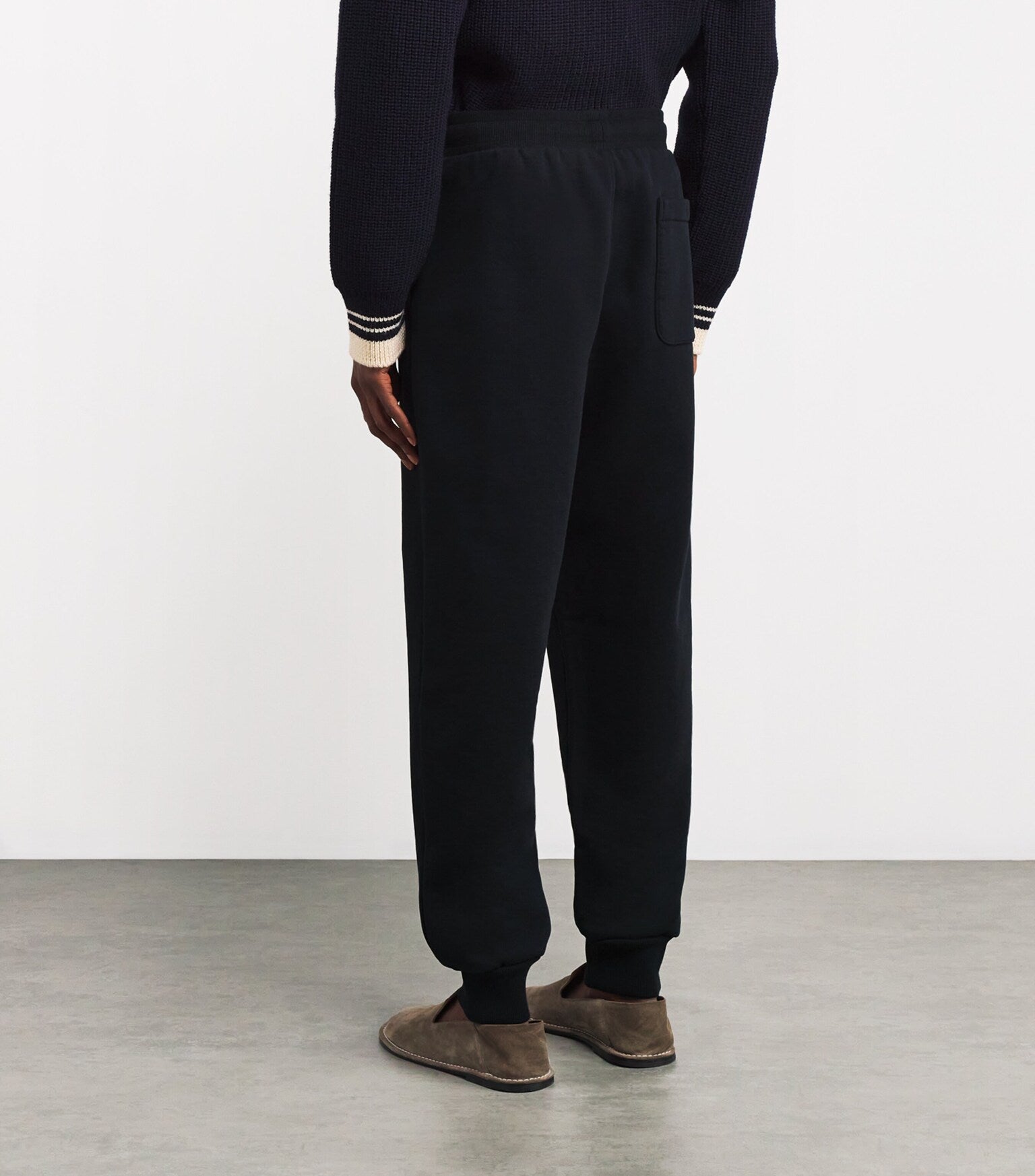 Black sweatpants on a white background
