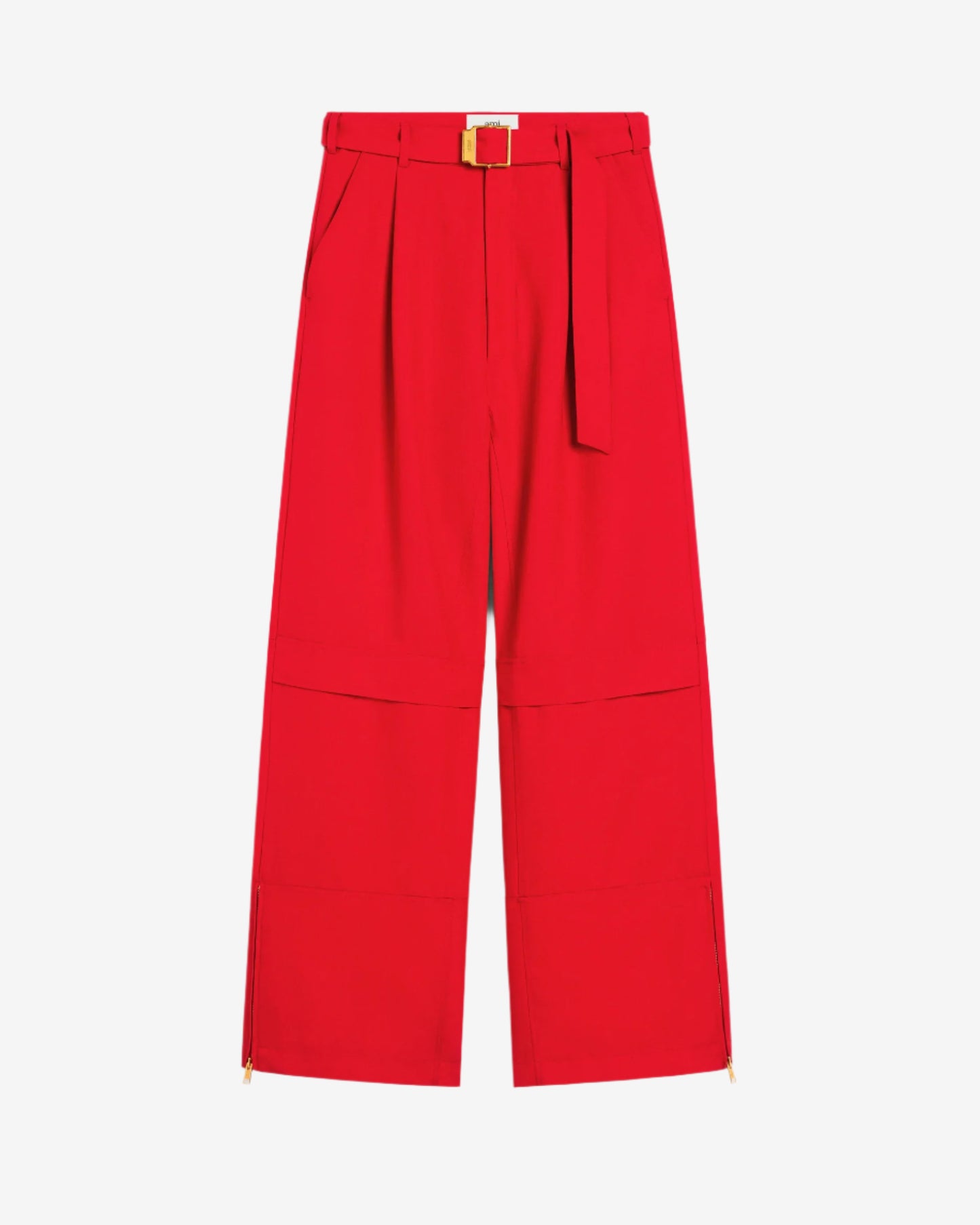 Red pants with a belt on a beige background