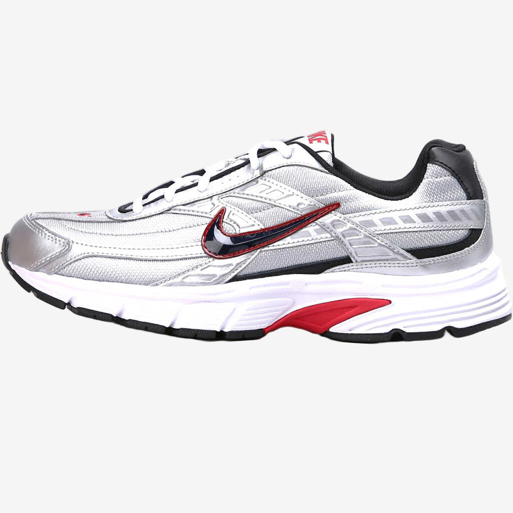 Gray running shoe with red and black accents on a white background