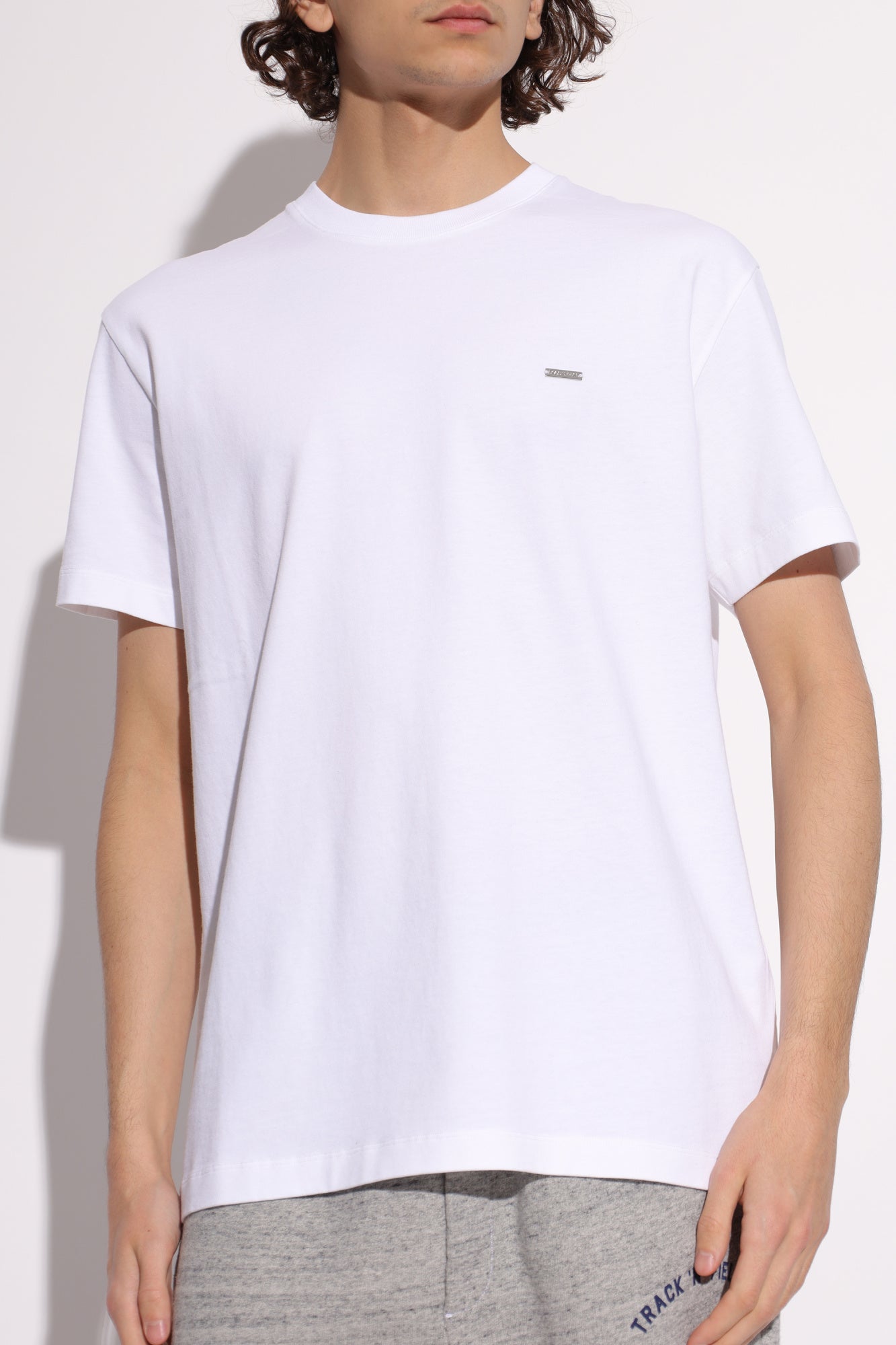 White t-shirt with a small logo on a white background DSQUARED2