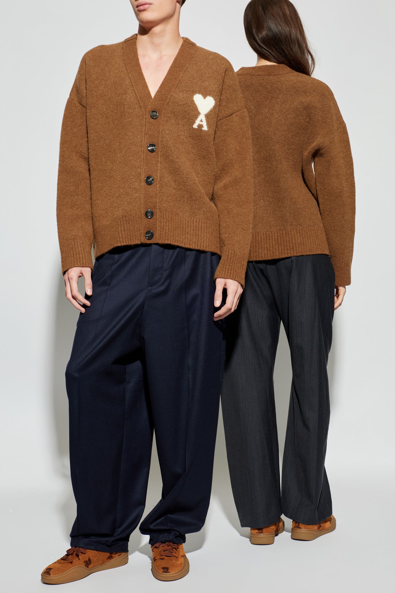 Brown cardigan with a heart and letter 'A' design on a white background ami paris