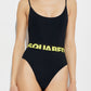 Black swimsuit with yellow logo on a white background