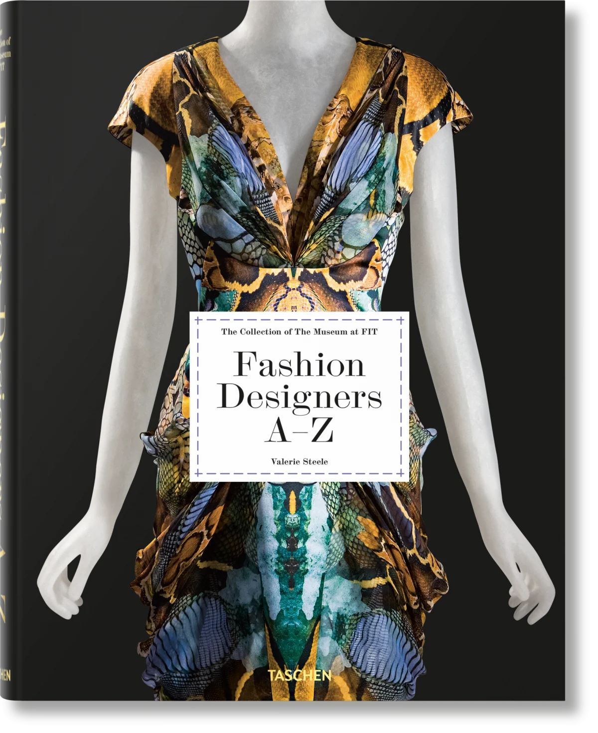 Book cover of 'Fashion Designers A-Z' with a mannequin wearing a patterned dress on a black background