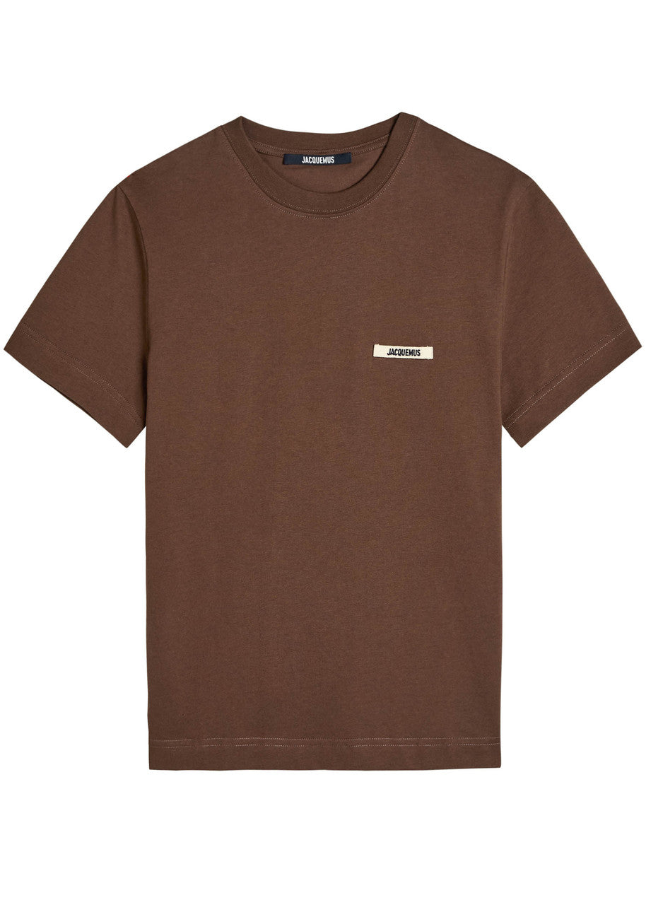 brown t-shirt with a small logo on a white background JACQUEMUS