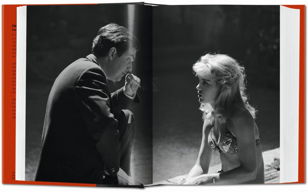 Open book showing a black and white photograph of a man and woman in a close interaction.