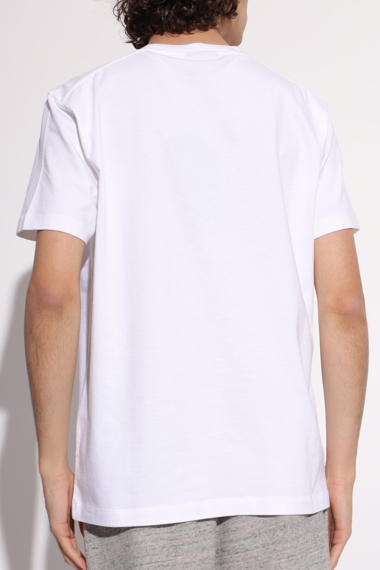 White t-shirt with a small logo on a white background DSQUARED2