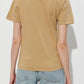 dark beige t-shirt with a small logo on a white background JACQUEMUS