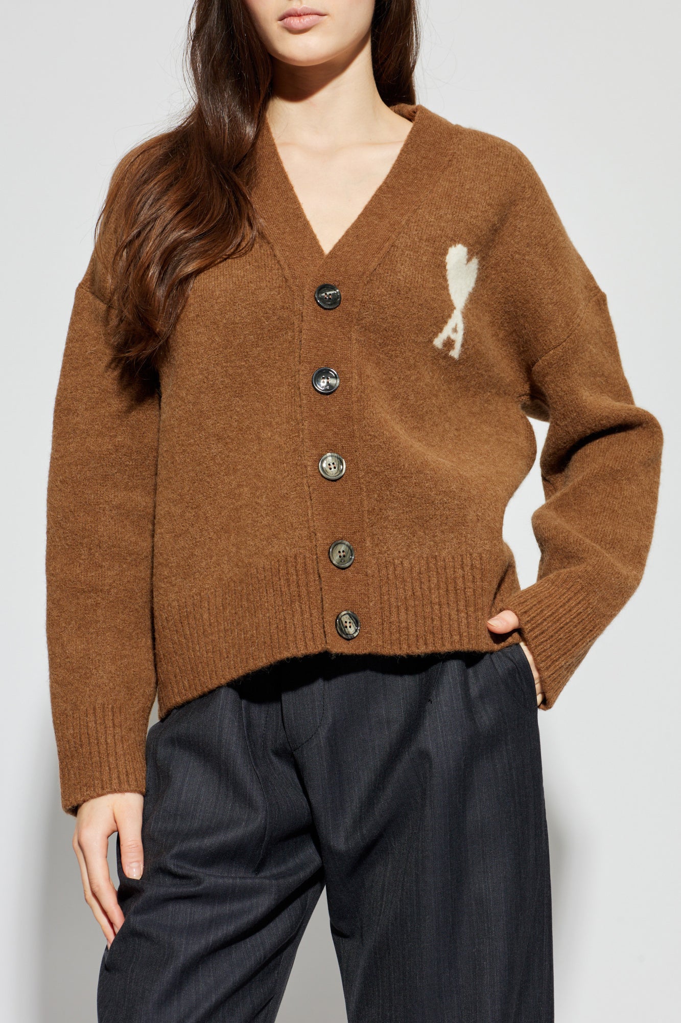 Brown cardigan with a heart and letter 'A' design on a white background ami paris