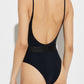 Black swimsuit with yellow logo on a white background