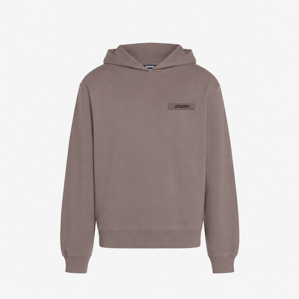 brown hoodie with a small logo on the chest against a white background