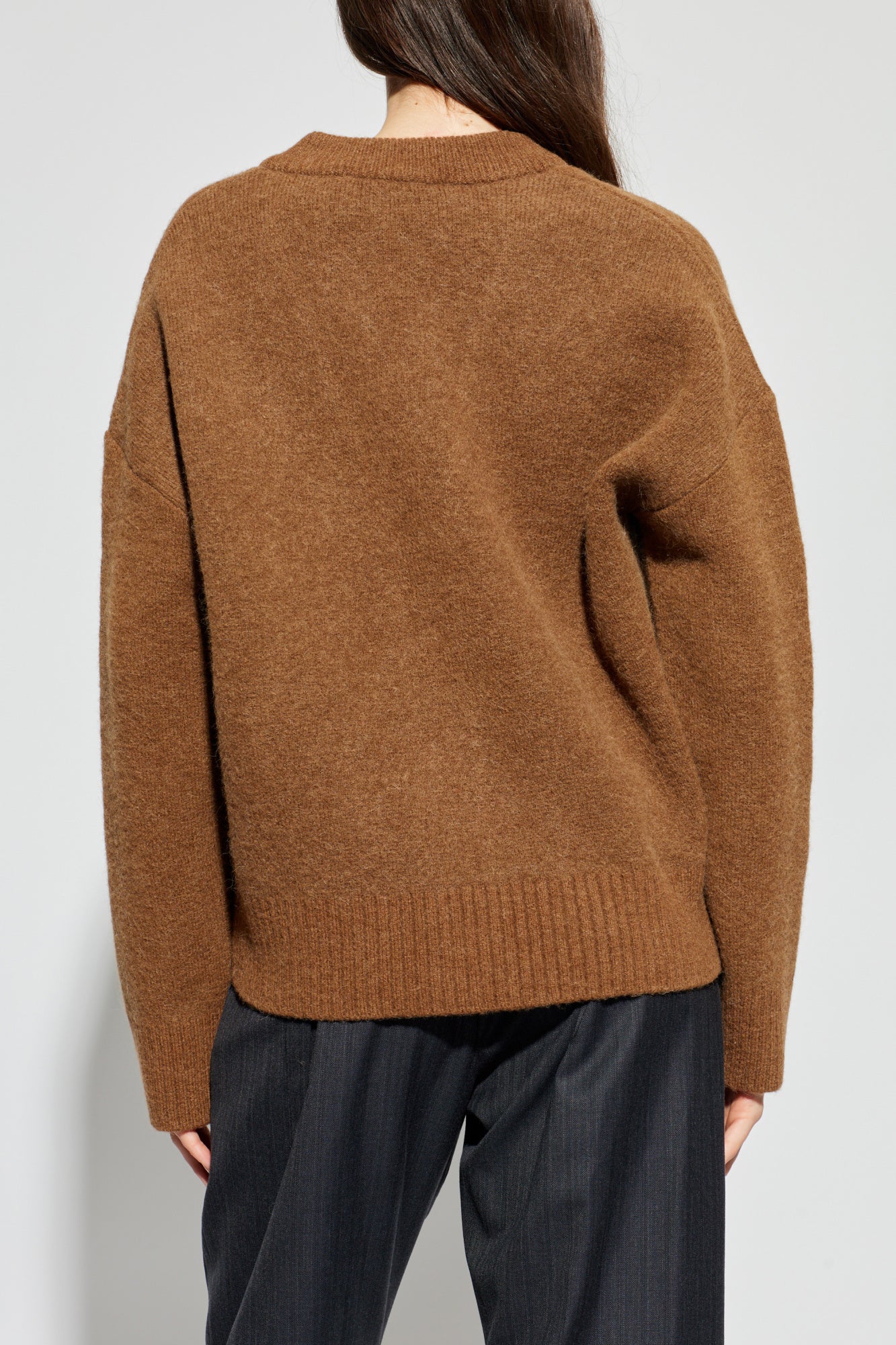 Brown cardigan with a heart and letter 'A' design on a white background ami paris