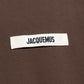 Brown sweatshirt with a small logo on a white background